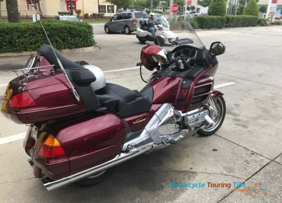 Goldwing parked at a gas station