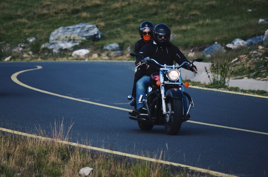 motorcycle rider and passenger